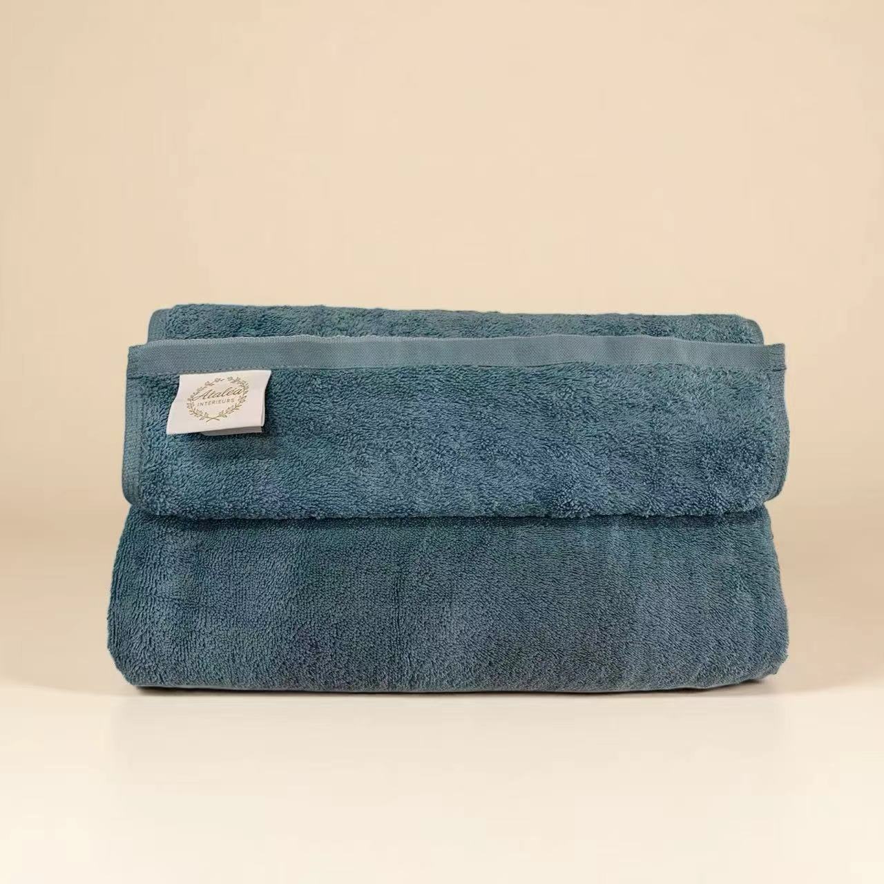 Serviette de toilette bleu paon